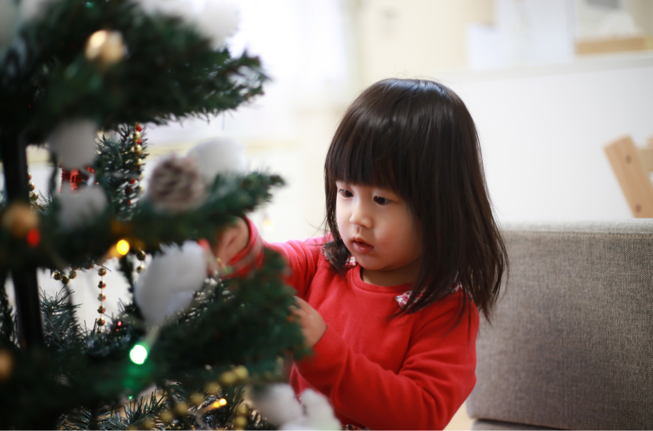 Child and Christmas Tree