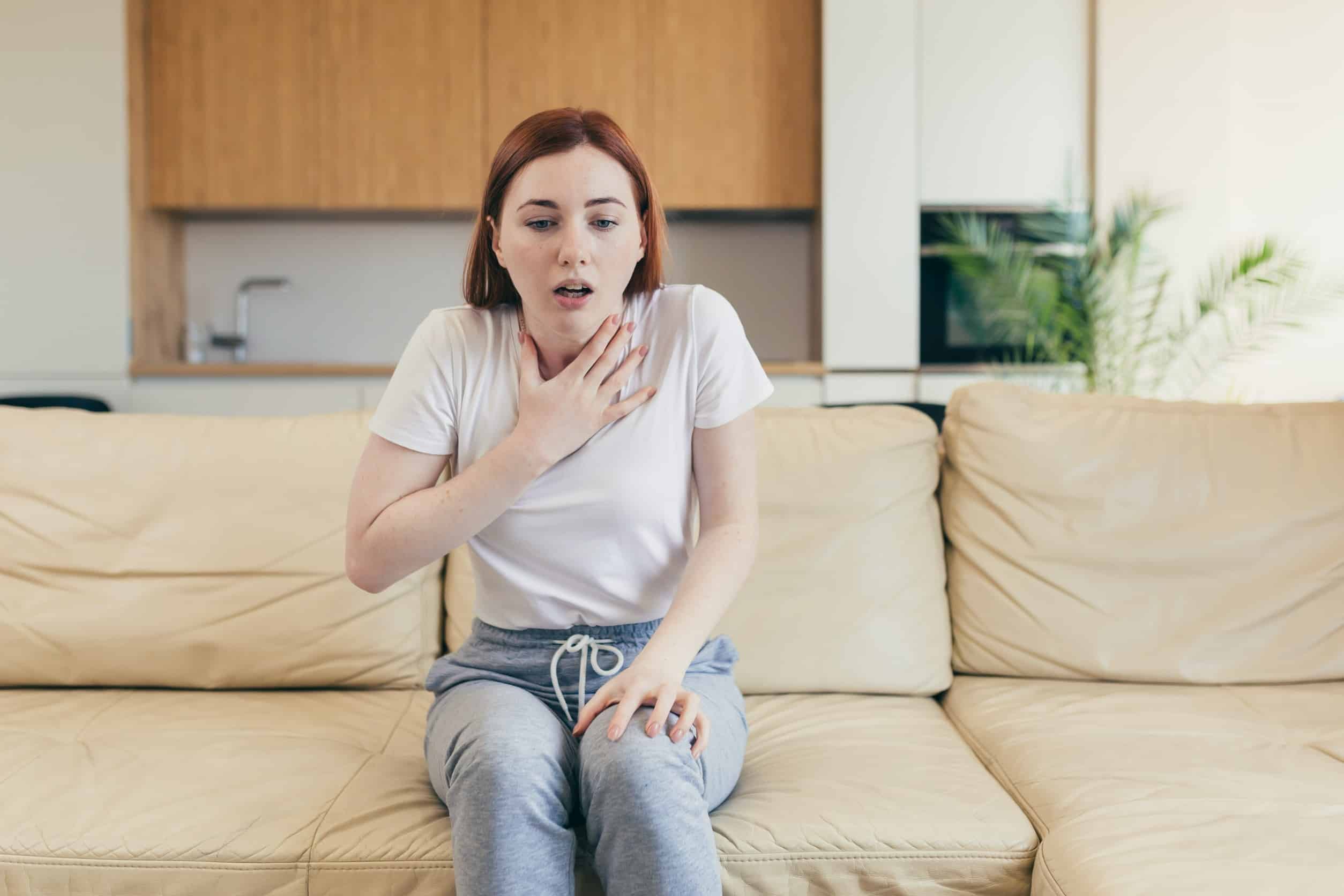 Girl on couch unable to breathe